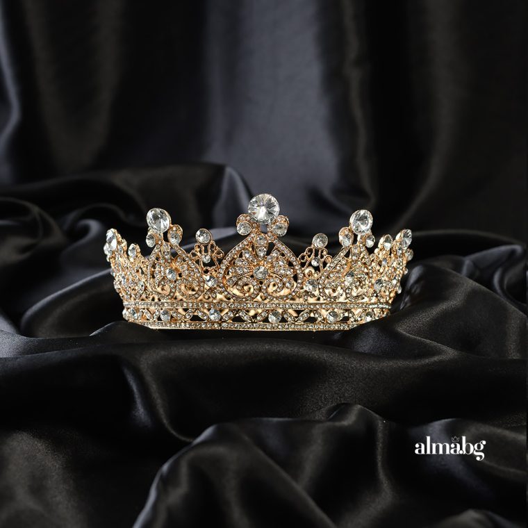 Gold-colored crown inlaid with crystals